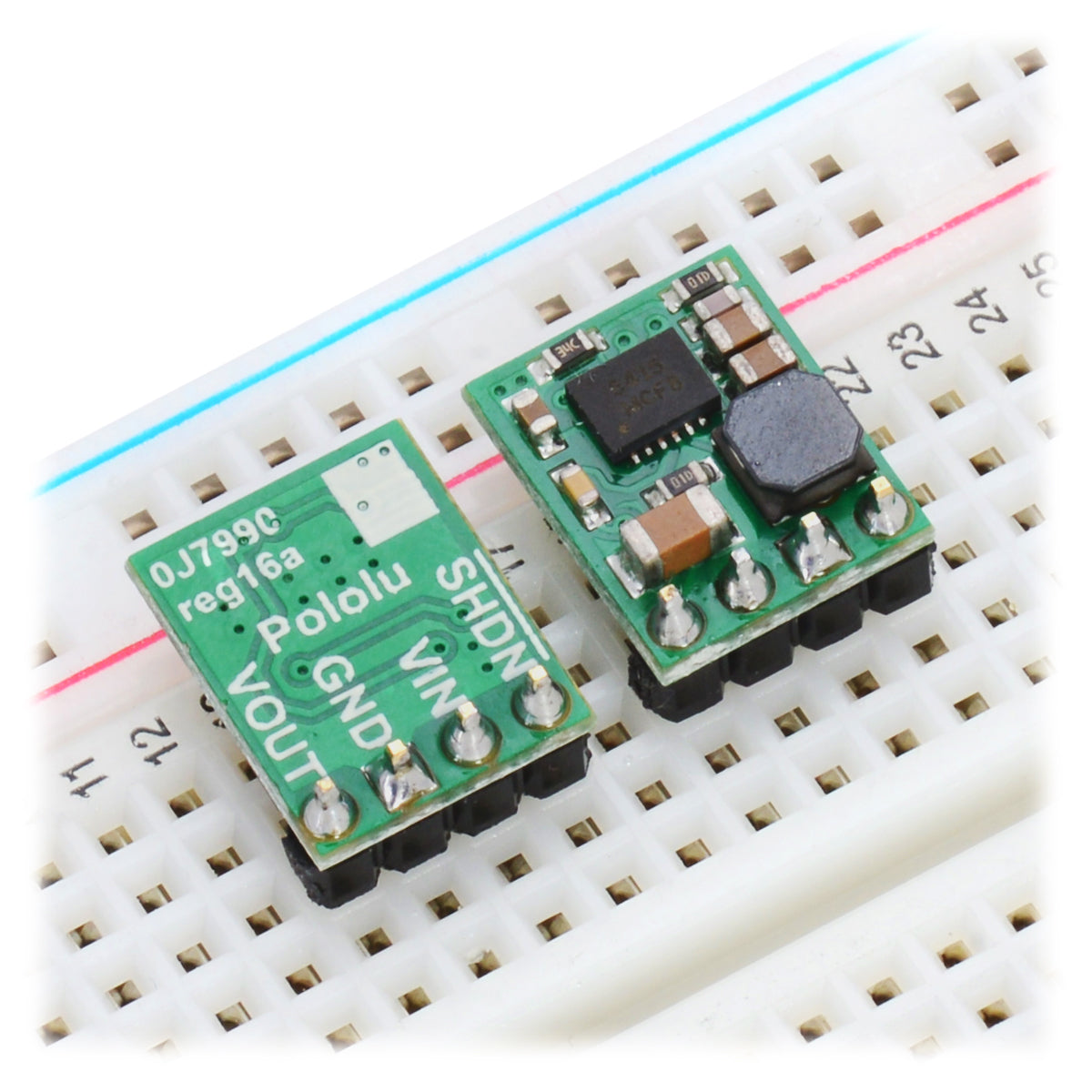 Pololu step-down voltage regulators D24V5Fx in a breadboard.