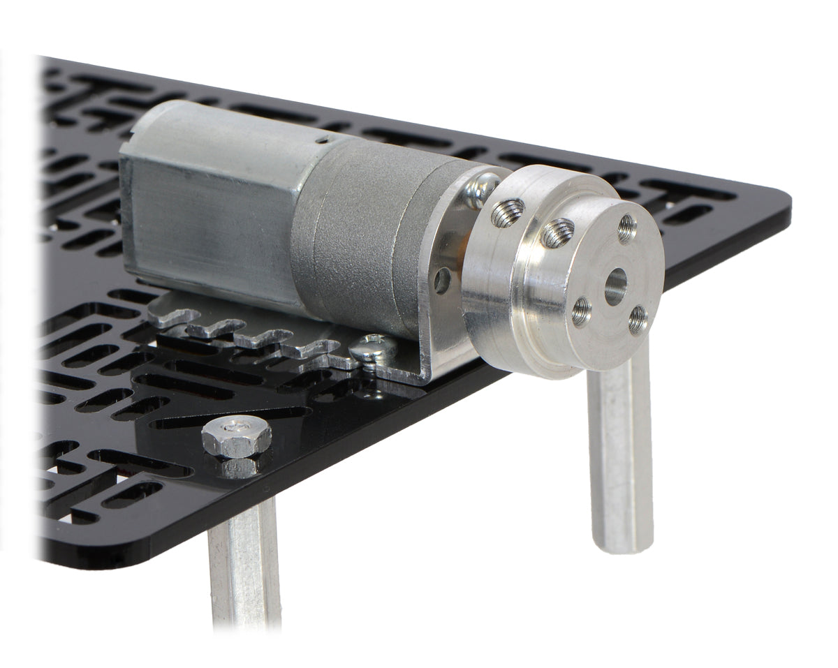 The machined piece of the 4 mm scooter wheel adapter mounted to the output shaft of a 20D mm gearmotor.