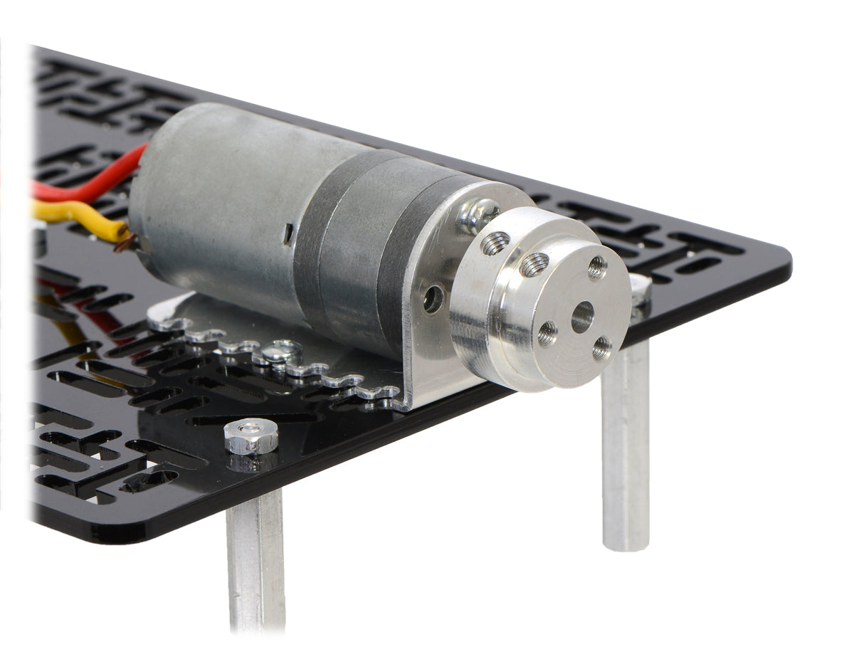 The machined piece of the 4 mm scooter wheel adapter mounted to the output shaft of a 25D mm gearmotor.