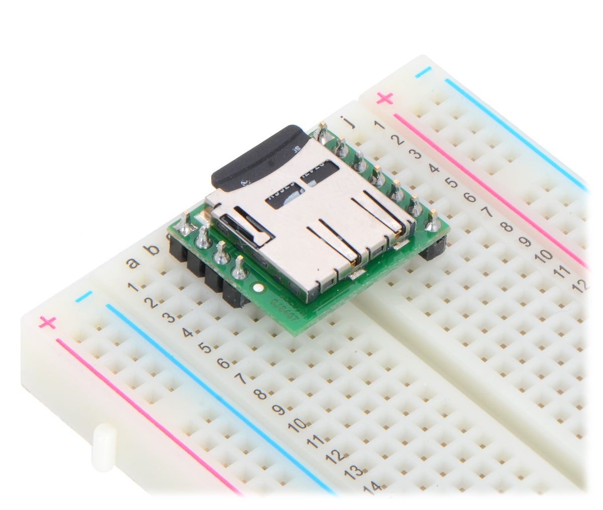 Breakout Board for microSD Card plugged into a breadboard with microSD card (not included) inserted.