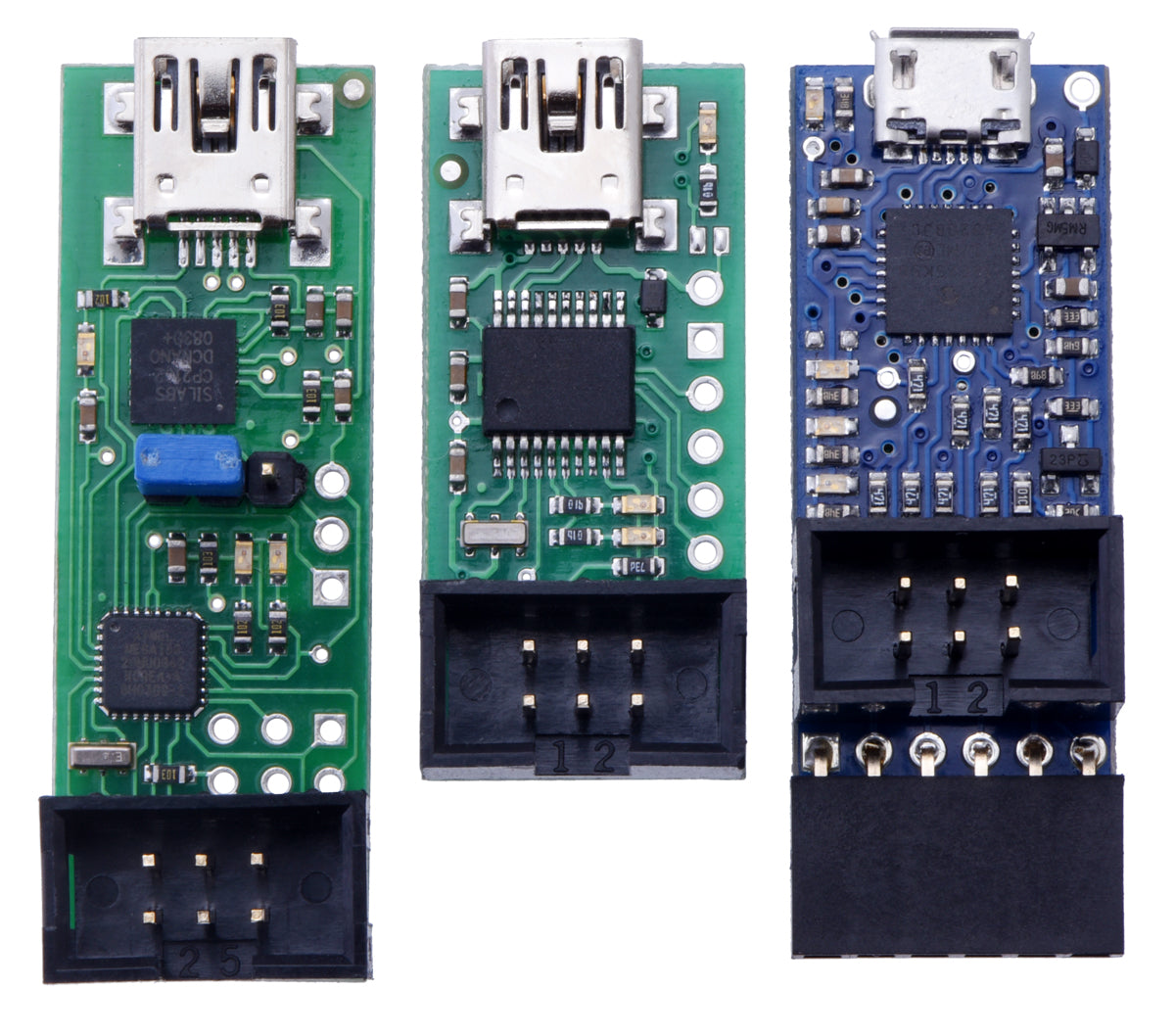 From left to right: the original Orangutan USB Programmer, the Pololu USB AVR Programmer, and the Pololu USB AVR Programmer v2 (which looks almost the same as v2.1).