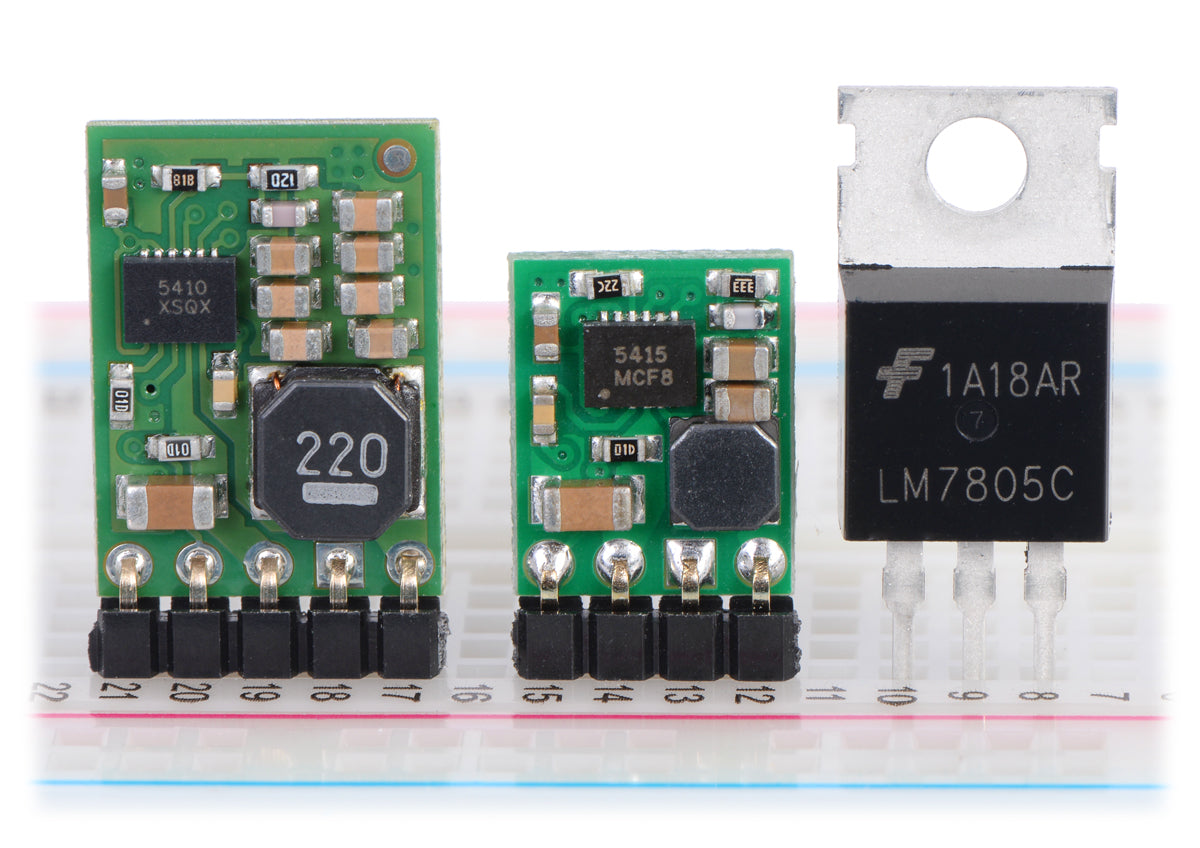 Pololu step-down voltage regulators D24V10Fx and D24V5Fx next to a 7805 voltage regulator in TO-220 package.