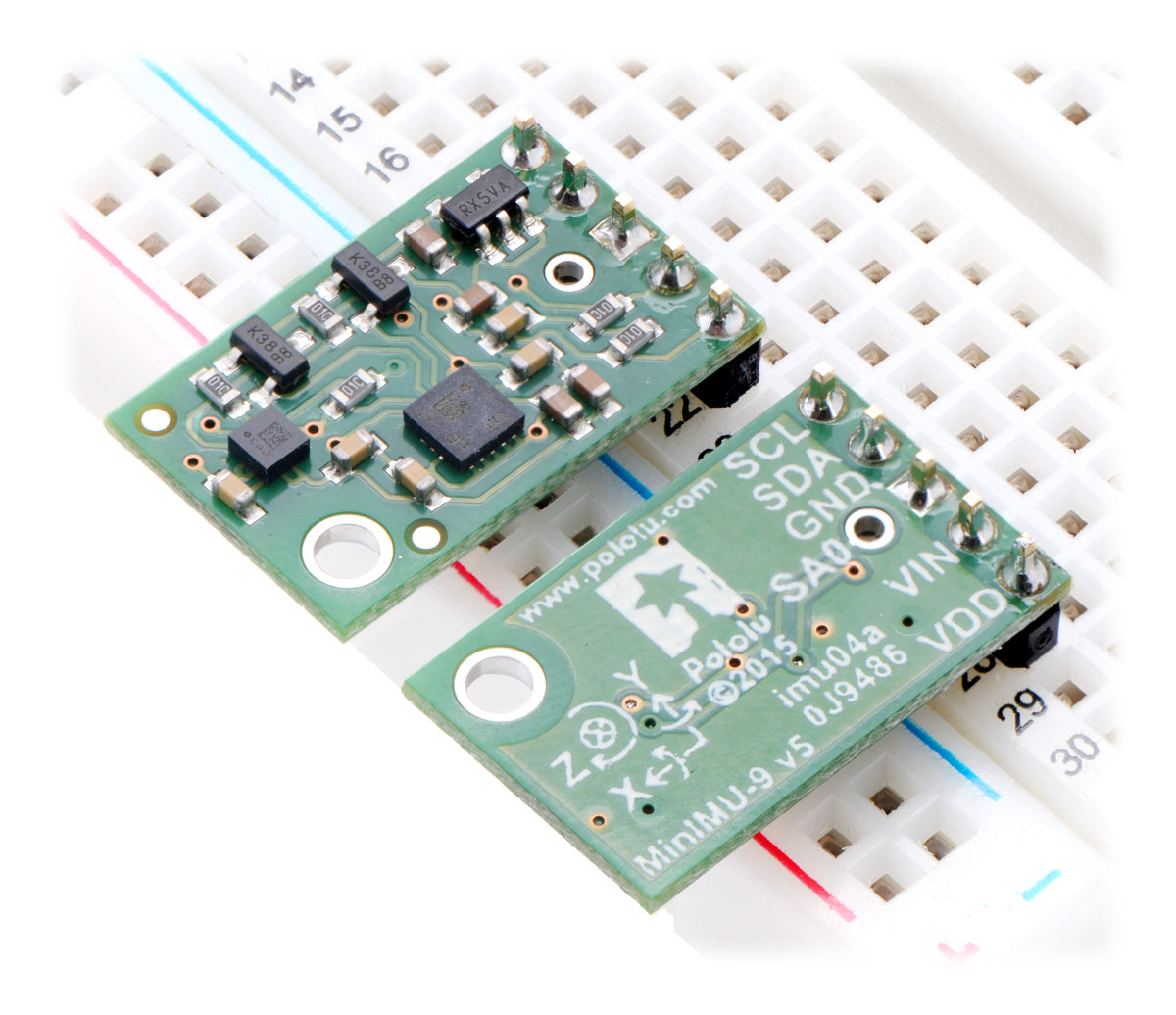 Two Pololu MinIMU-9 v5 modules in a breadboard.